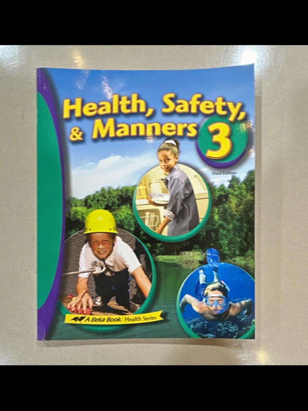 Health, Safety & Manners 3 Textbook - Bright Blue & Green Cover